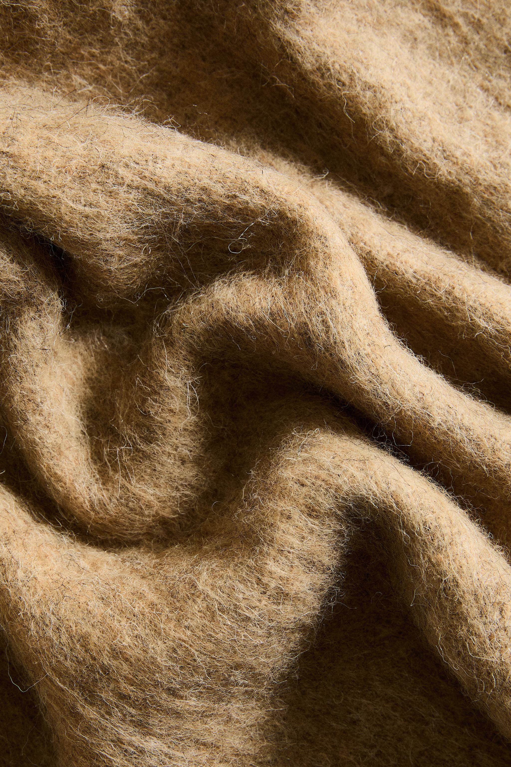 FRINGED SOFT BLANKET